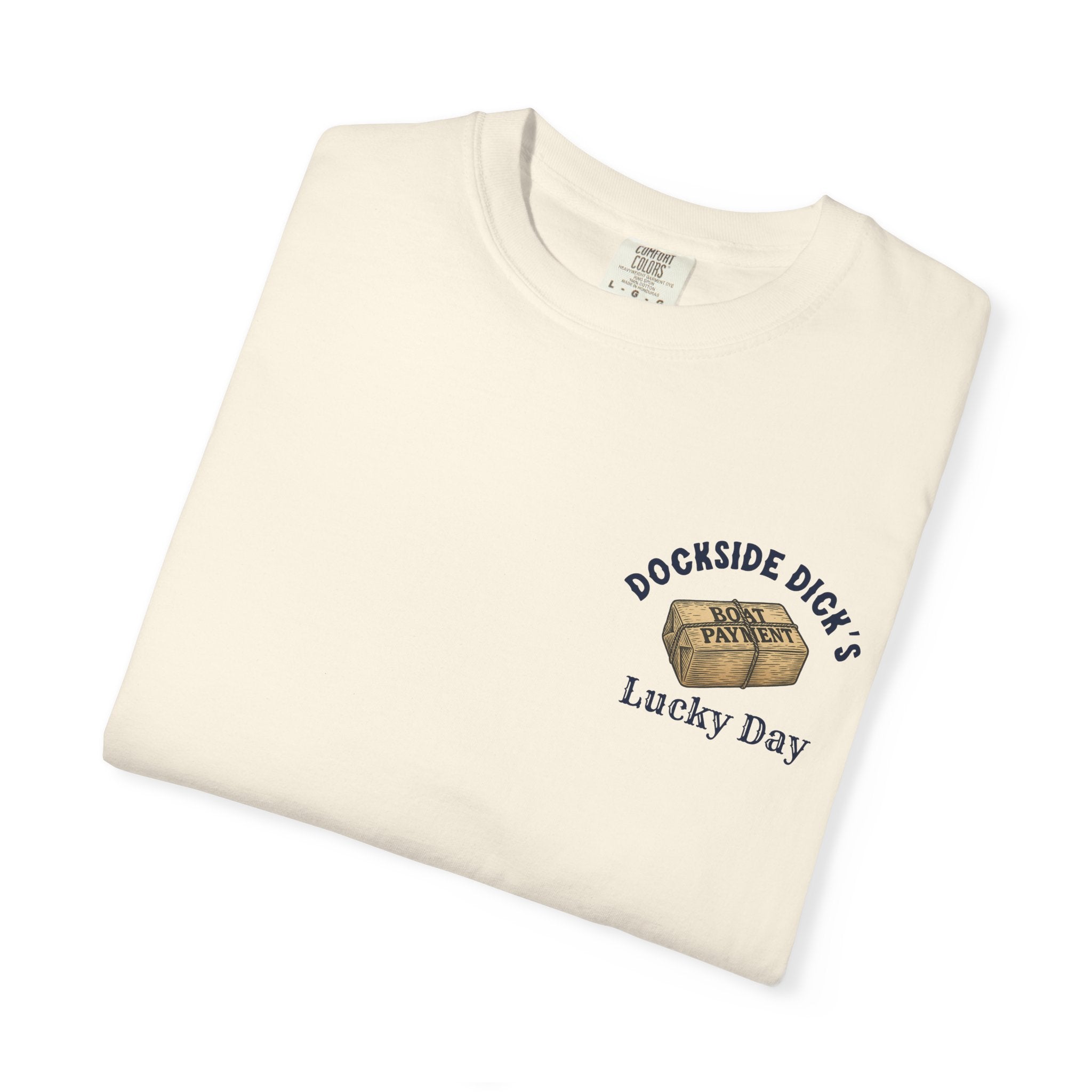 Folded ivory Lucky Day Tee - Square Grouper Shirt featuring Dockside Dick’s chest print, a relaxed-fit tee for beach and fishing lovers.