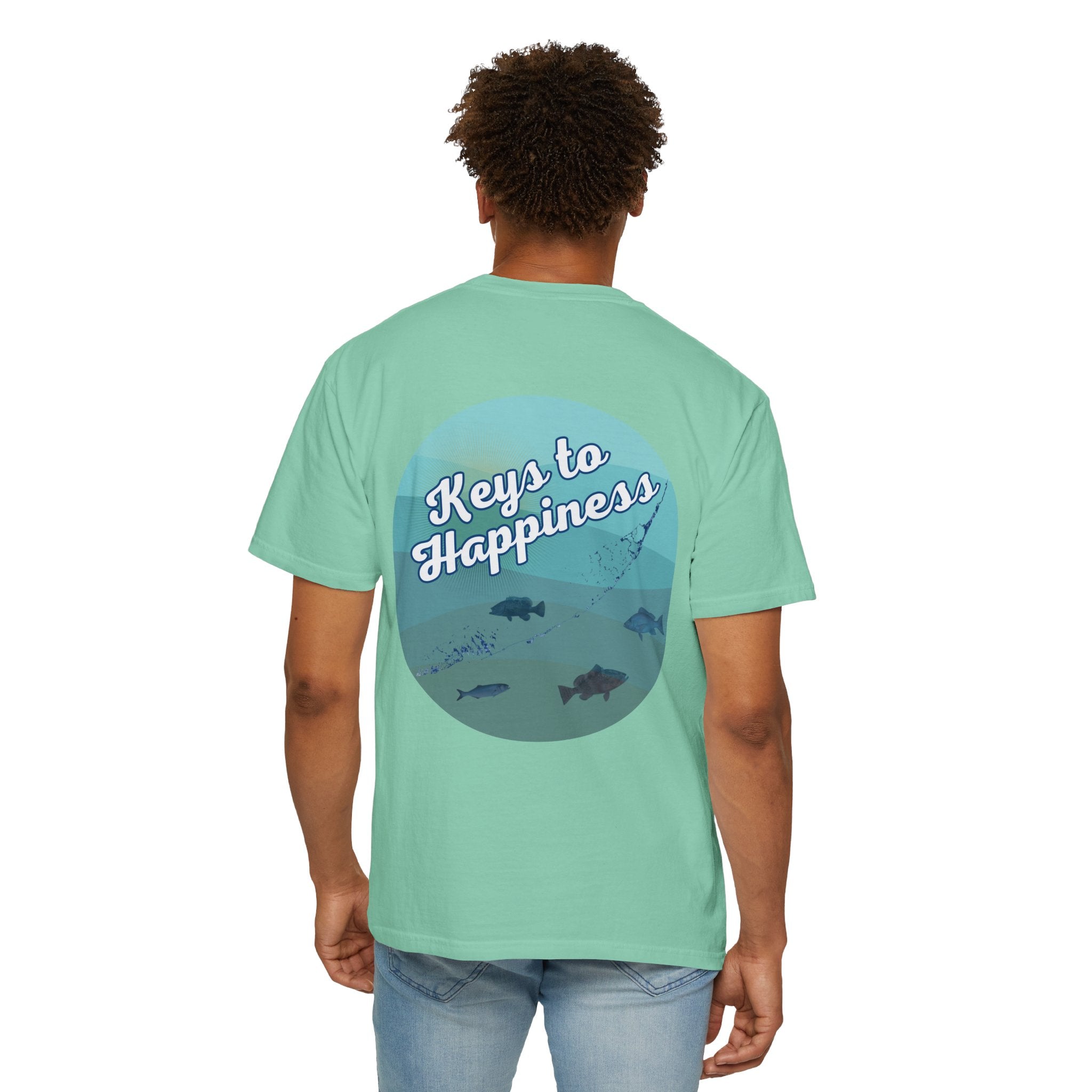 Person wearing a light green t-shirt with 'Keys to Happiness' design on the back.