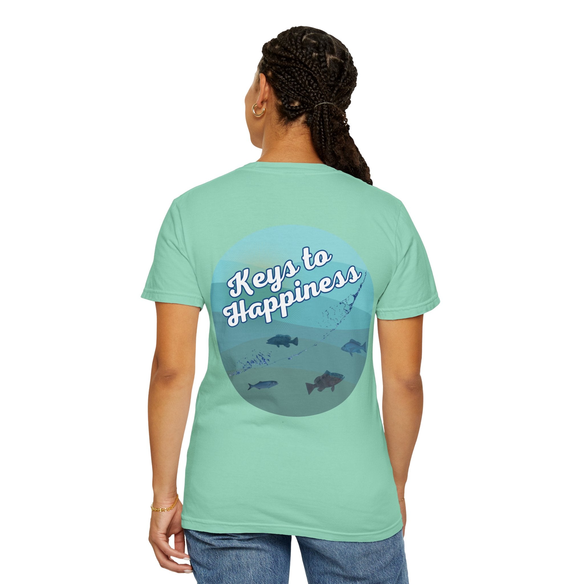 Person wearing a light green t-shirt with 'Keys to Happiness' design on the back.